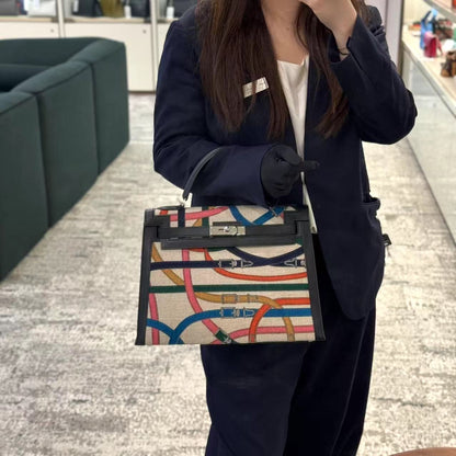 HERMÈS Kelly 32 Cavalcadour Toile de Camp