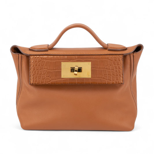 HERMÈS 24/24 - 21 mini Touch Gold